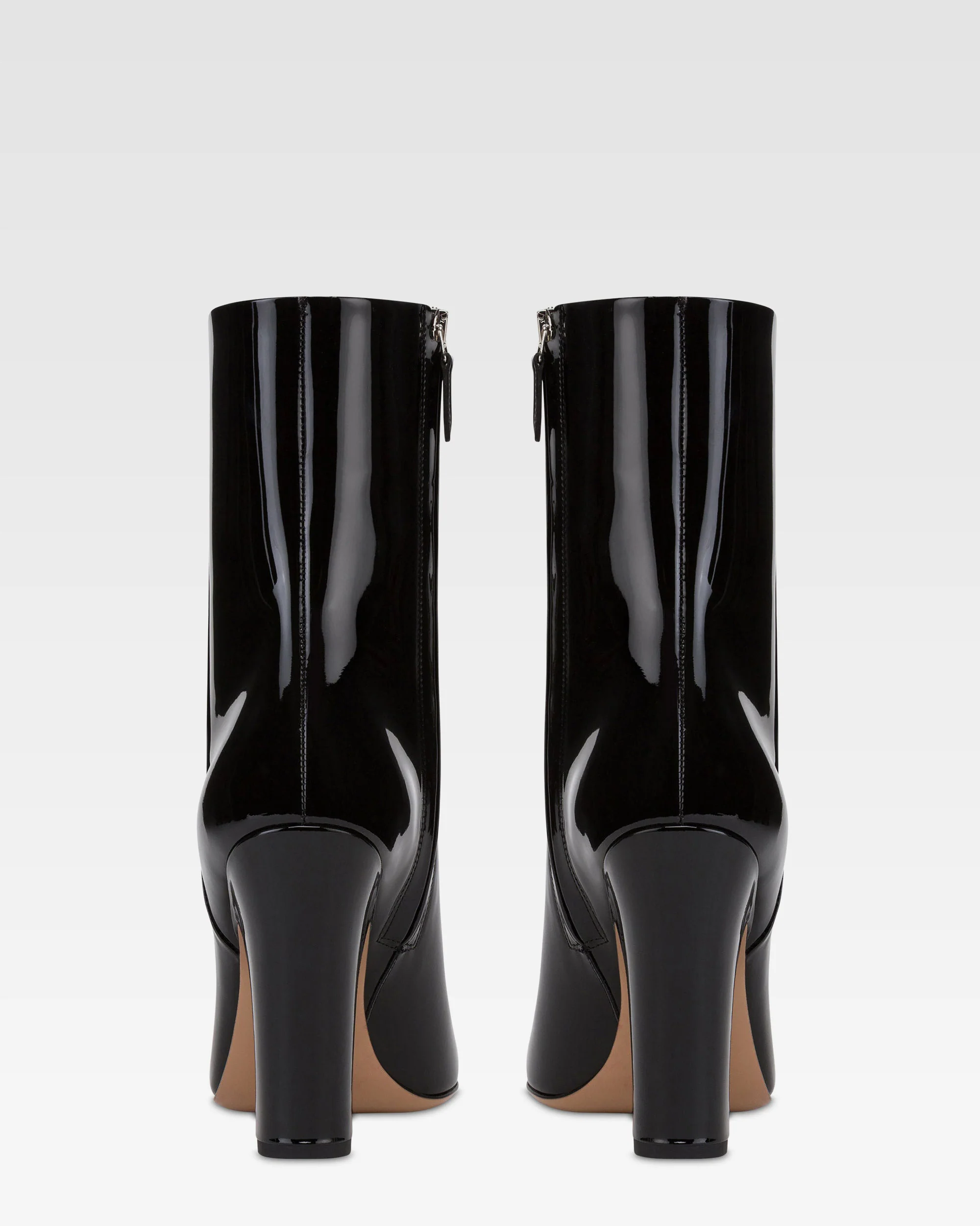 Ankle boots in black patent leather. - Image 4