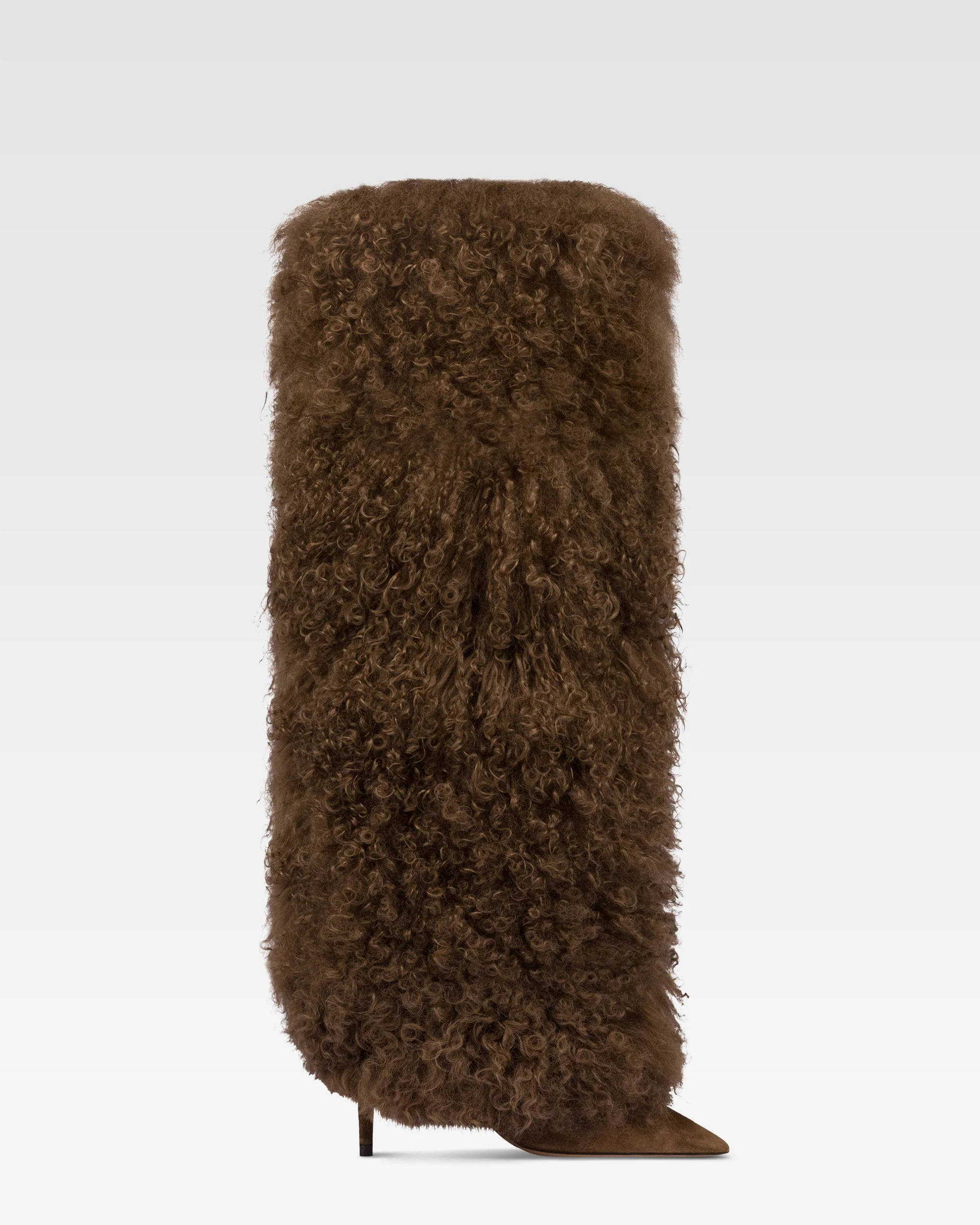 Boots in suede and brown mongolian fur