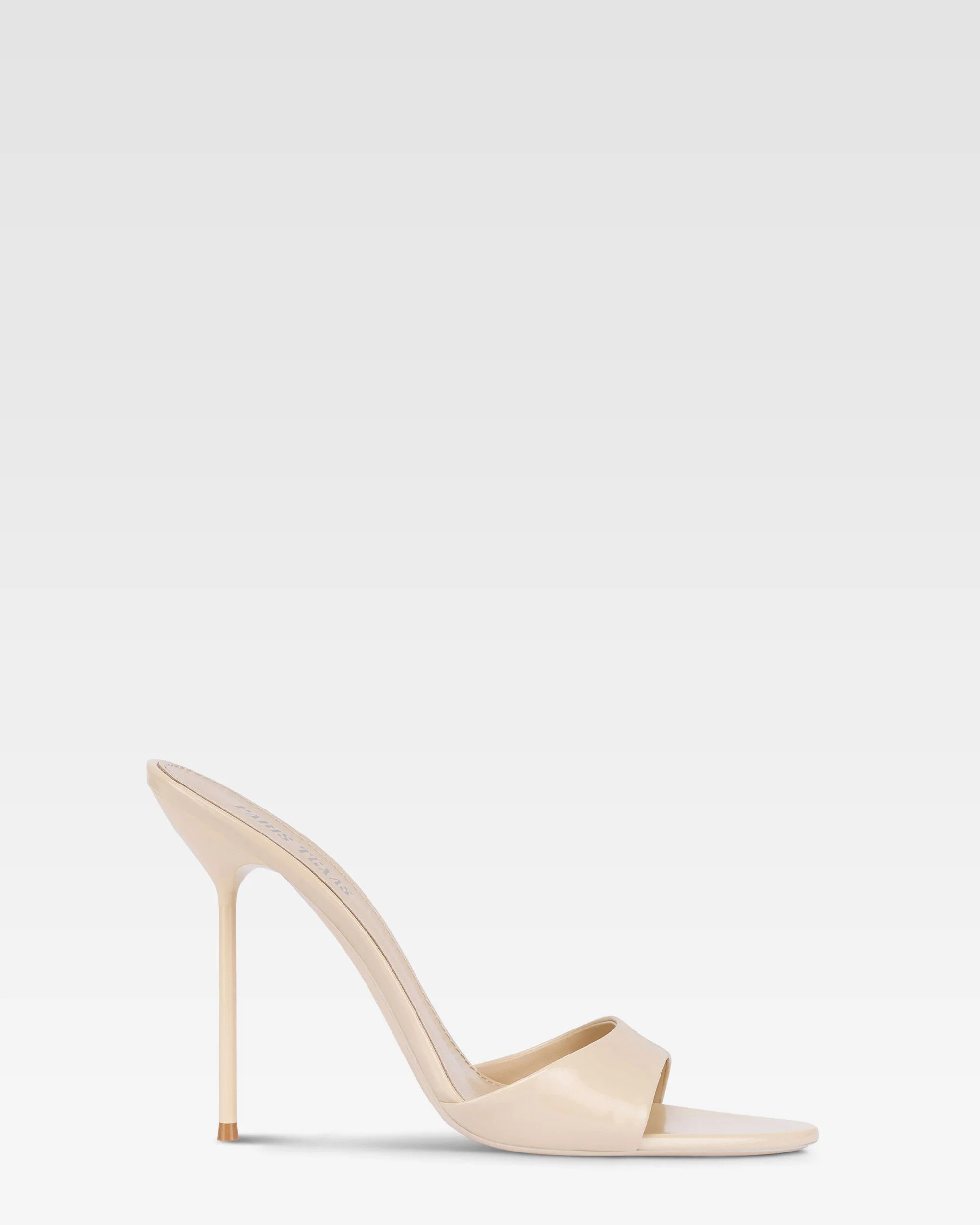 Mules in almond patent leather
